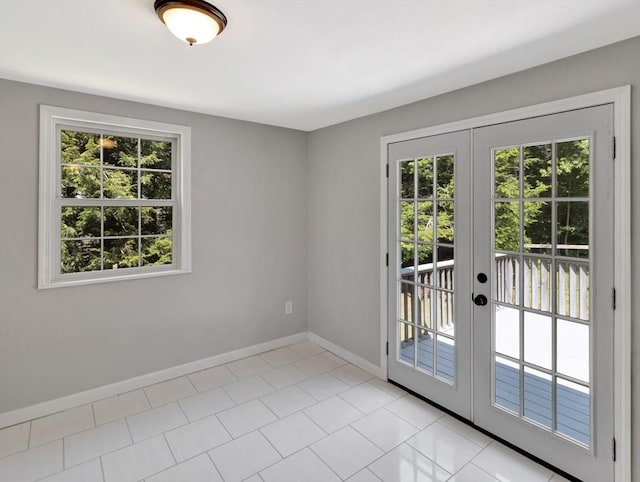 4 Gary Rd, Norton, MA 02766 - unfurnished room with french doors and light tile patterned flooring
