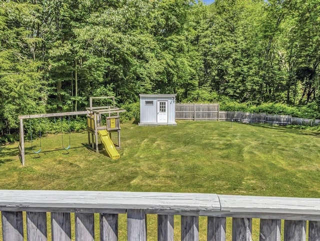 4 Gary Rd, Norton, MA 02766 - fenced backyard featuring a playground and a shed