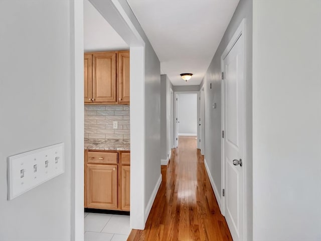 4 Gary Rd, Norton, MA 02766 - corridor featuring light wood-style flooring and baseboards