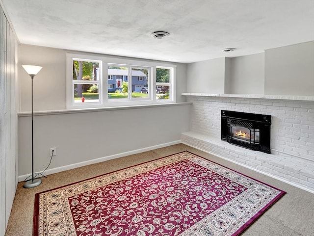 4 Gary Rd, Norton, MA 02766 - unfurnished living room featuring carpet floors and a brick fireplace