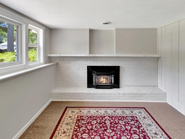 4 Gary Rd, Norton, MA 02766 - detailed view of carpet and a brick fireplace
