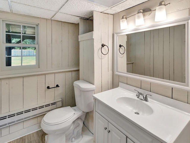 4 Gary Rd, Norton, MA 02766 - bathroom featuring a baseboard radiator, vanity, and wood walls