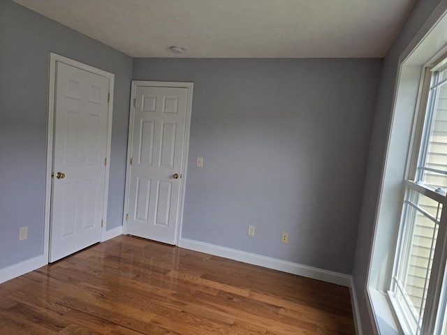 62 Saint Anthony St, Fitchburg, MA 01420 - empty room with wood finished floors