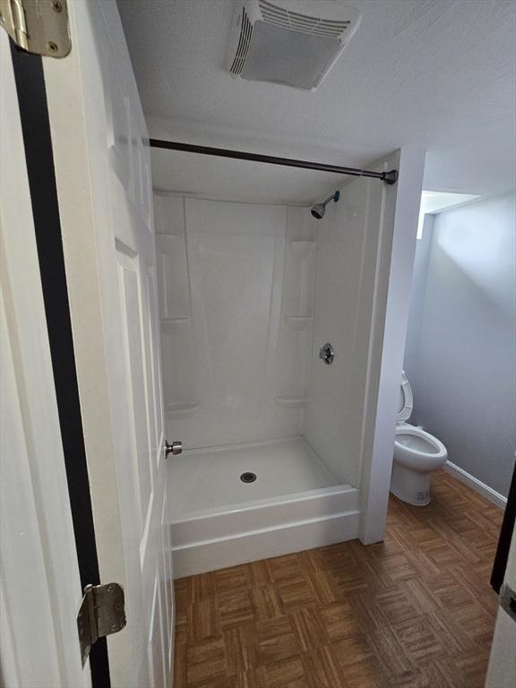 62 Saint Anthony St, Fitchburg, MA 01420 - full bathroom featuring toilet and a shower