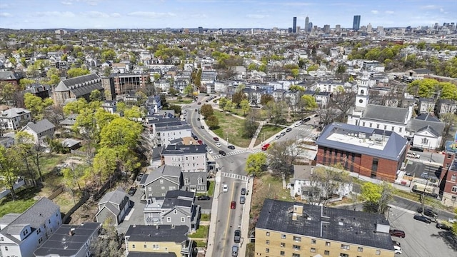 birds eye view of property featuring a city view