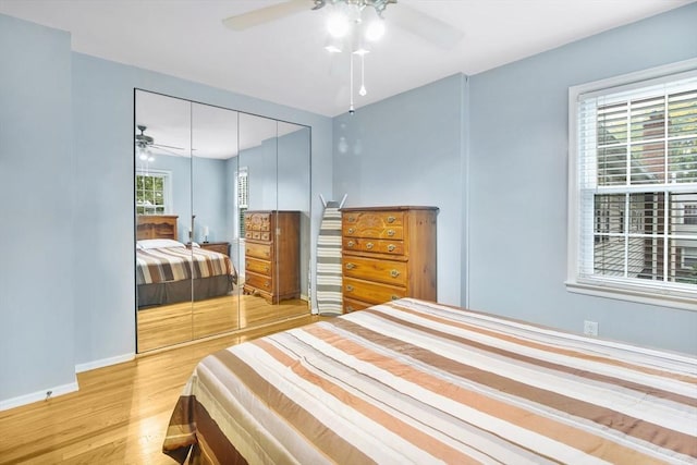 80 Brush Hill Ave Unit 33, West Springfield, MA 01089 - bedroom featuring a closet, wood finished floors, baseboards, and ceiling fan