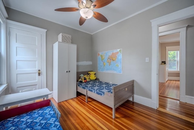 56 Marlboro St Unit 1, Belmont, MA 02478 - bedroom featuring wood finished floors, crown molding, baseboards, and ceiling fan