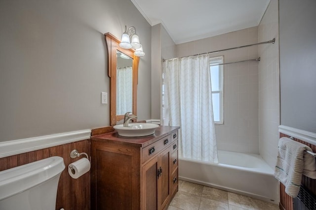 56 Marlboro St Unit 1, Belmont, MA 02478 - full bathroom with toilet, shower / bathtub combination with curtain, vanity, tile patterned flooring, and wainscoting