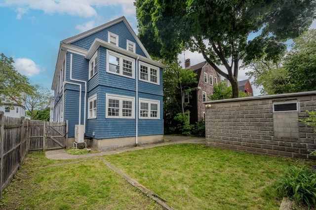 56 Marlboro St Unit 1, Belmont, MA 02478 - rear view of property featuring a gate
