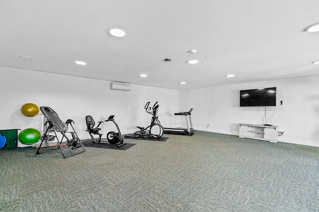 exercise room with carpet flooring and a wall mounted AC