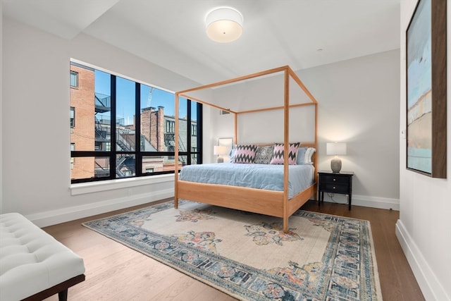 bedroom featuring wood-type flooring