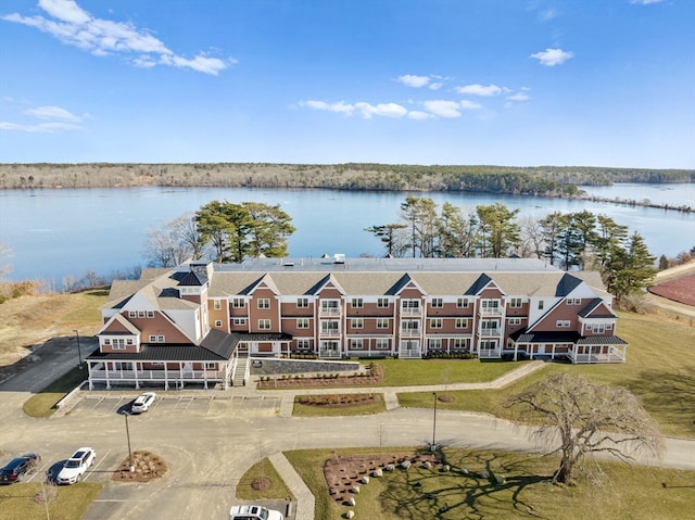 birds eye view of property featuring a water view