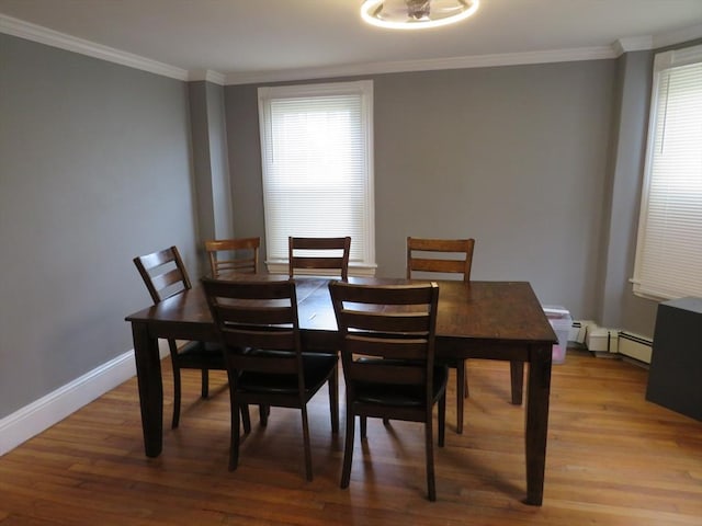 82 Main St, Blackstone, MA 01504 - dining room featuring light wood finished floors, ornamental molding, and baseboards