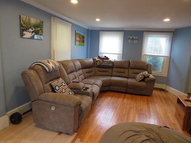 82 Main St, Blackstone, MA 01504 - living room featuring light wood finished floors, ornamental molding, baseboards, a baseboard heating unit, and recessed lighting