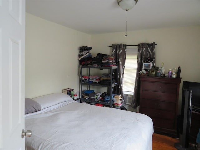 82 Main St, Blackstone, MA 01504 - bedroom featuring wood finished floors and cooling unit