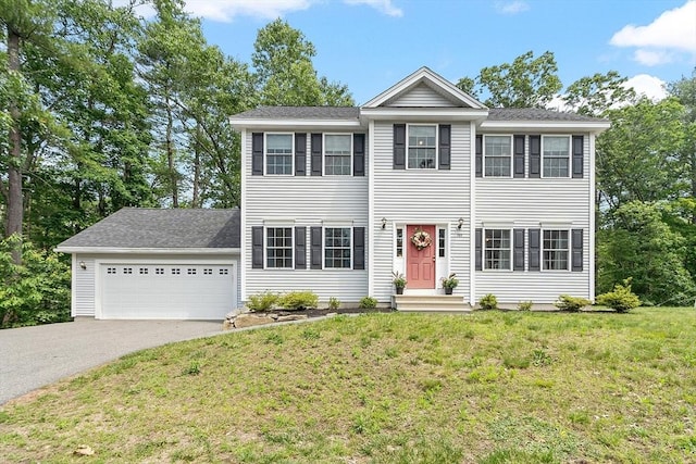 131 Great Rd, Shirley, MA 01464 - view of front of house with driveway, a garage, and a front lawn