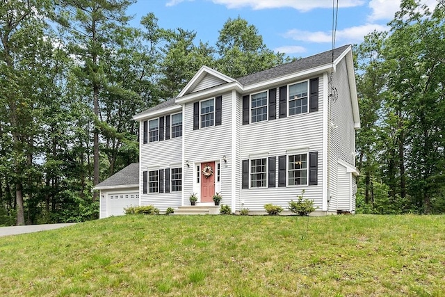 131 Great Rd, Shirley, MA 01464 - colonial house with a front lawn, a garage, and a shingled roof