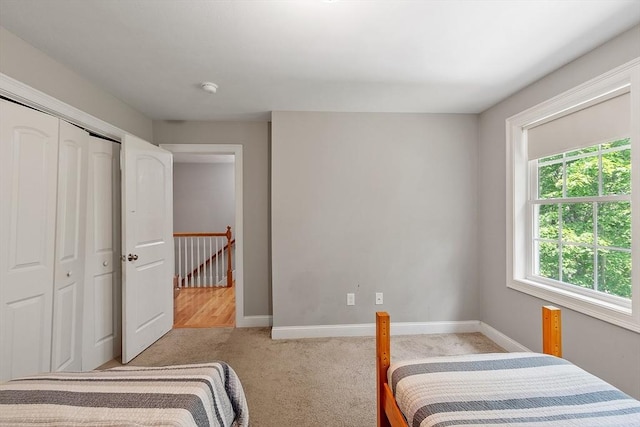 131 Great Rd, Shirley, MA 01464 - carpeted bedroom with baseboards and a closet