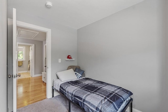 131 Great Rd, Shirley, MA 01464 - bedroom with attic access and light wood-style flooring