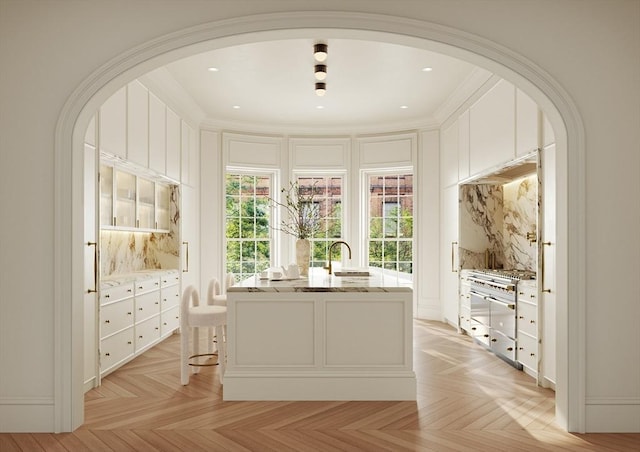 94 Mount Vernon St, Boston, MA 02108 - office space featuring arched walkways, a decorative wall, crown molding, a sink, and recessed lighting