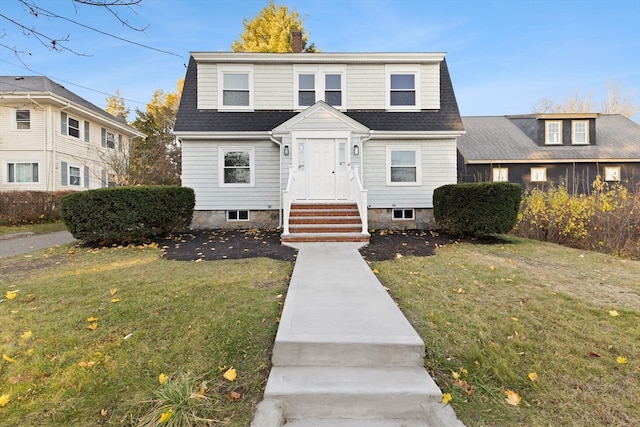 view of front facade with a front yard