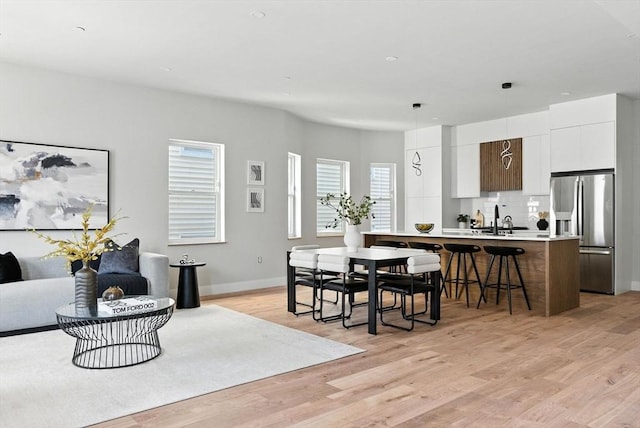 34 Woodford St Unit 2, Boston, MA 02125 - dining room with light wood-style floors