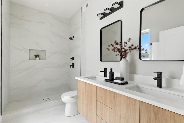 34 Woodford St Unit 2, Boston, MA 02125 - bathroom with double vanity, a marble finish shower, and marble finish floors