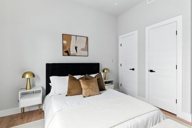 34 Woodford St Unit 2, Boston, MA 02125 - bedroom featuring wood finished floors and baseboards