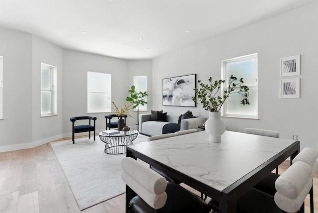 34 Woodford St Unit 2, Boston, MA 02125 - dining space featuring plenty of natural light and light wood-type flooring