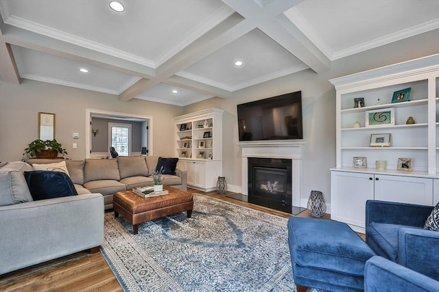 living room featuring hardwood / wood-style flooring, crown molding, beamed ceiling, and coffered ceiling