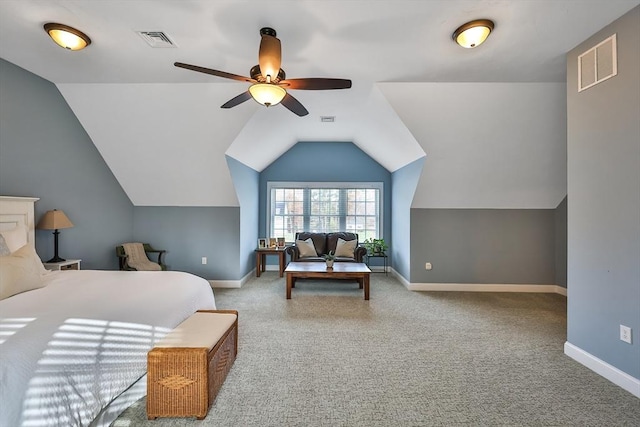 carpeted bedroom featuring ceiling fan and vaulted ceiling