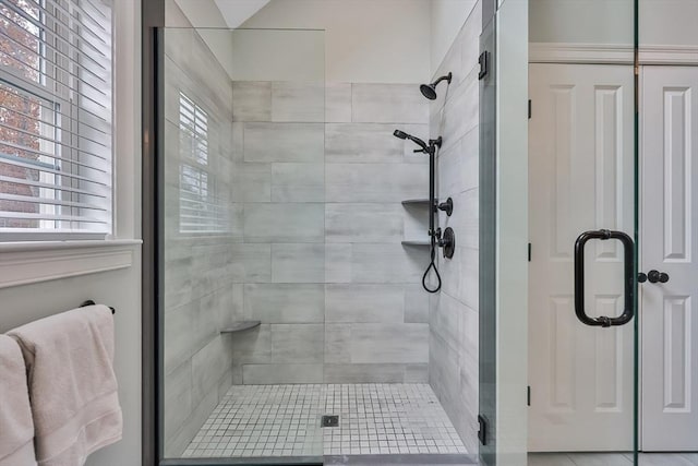 bathroom with an enclosed shower