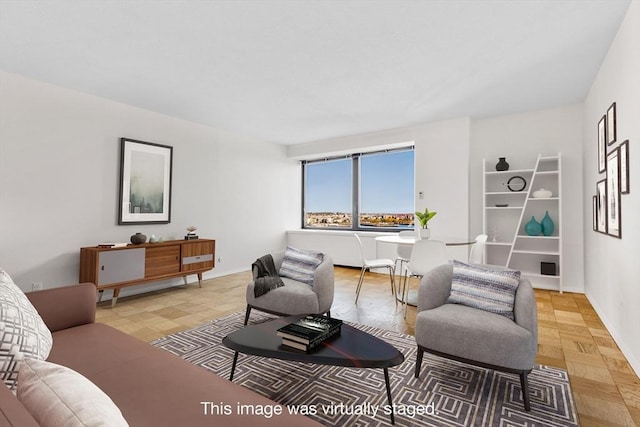 living room featuring parquet floors