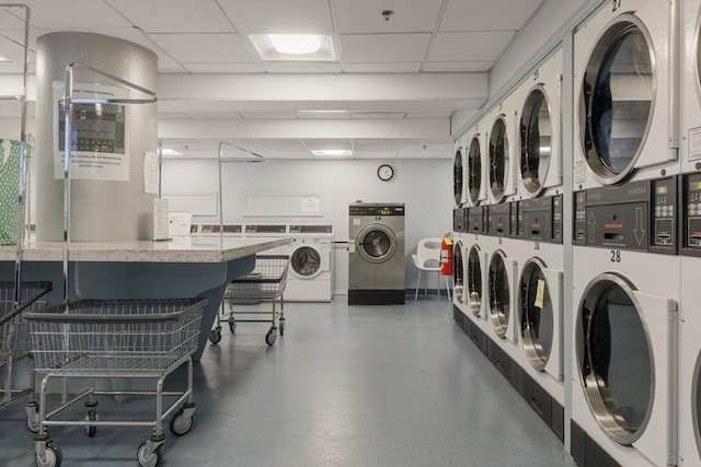 laundry room featuring separate washer and dryer and stacked washer and dryer