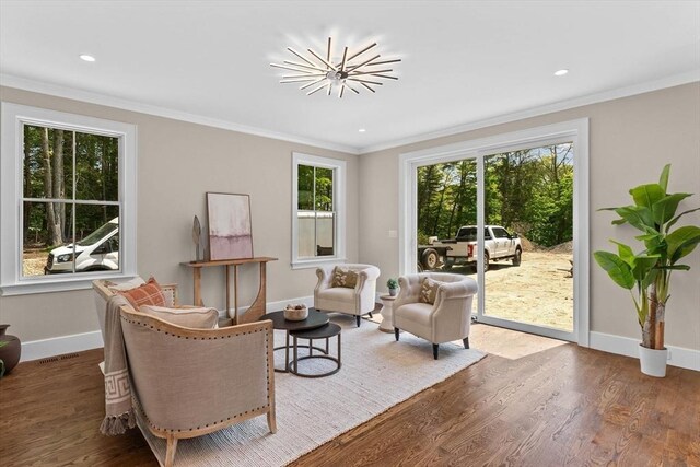 1780 Central Ave, Needham, MA 02492 - sitting room featuring healthy amount of natural light, baseboards, wood finished floors, ornamental molding, and recessed lighting