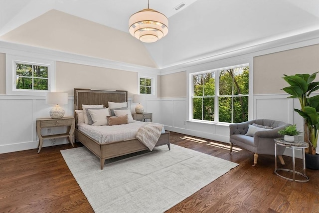 1780 Central Ave, Needham, MA 02492 - bedroom featuring vaulted ceiling, wainscoting, a decorative wall, and dark wood-type flooring