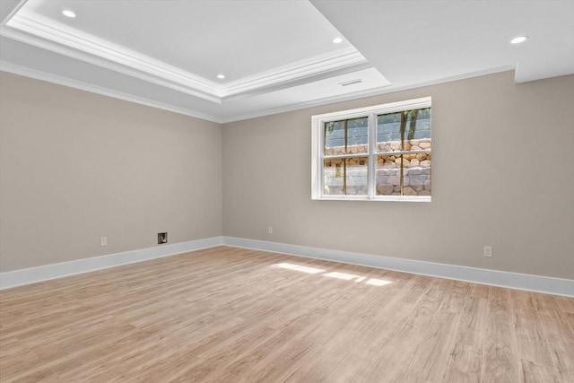 1780 Central Ave, Needham, MA 02492 - spare room featuring ornamental molding, a raised ceiling, light wood-style floors, recessed lighting, and baseboards