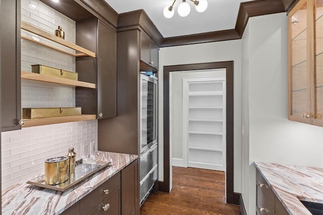 1780 Central Ave, Needham, MA 02492 - kitchen featuring open shelves, decorative backsplash, dark wood-type flooring, dark brown cabinets, and light stone counters