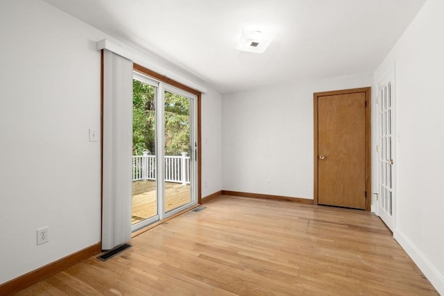 35 Bemis St, Weston, MA 02493 - spare room with light wood-style floors and baseboards