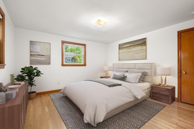 35 Bemis St, Weston, MA 02493 - bedroom with light wood-style flooring and baseboards