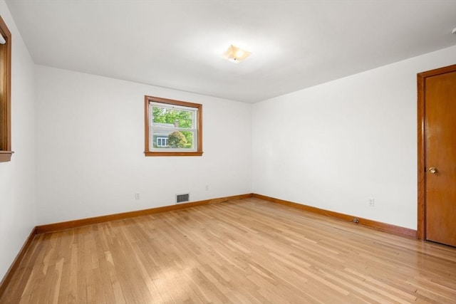35 Bemis St, Weston, MA 02493 - spare room with light wood-style floors and baseboards