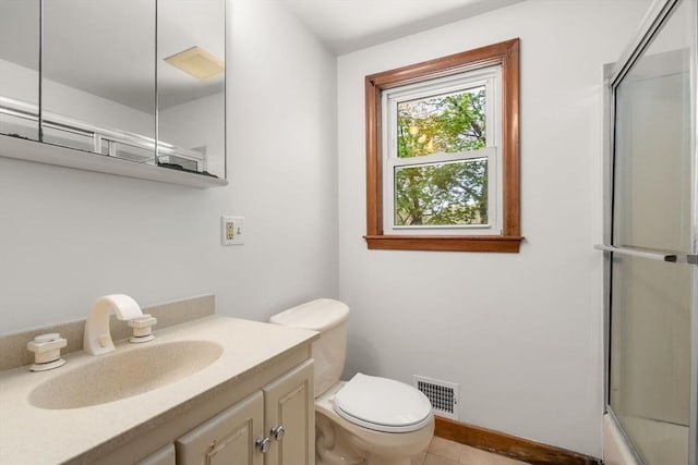 35 Bemis St, Weston, MA 02493 - bathroom with toilet, vanity, and tile patterned floors