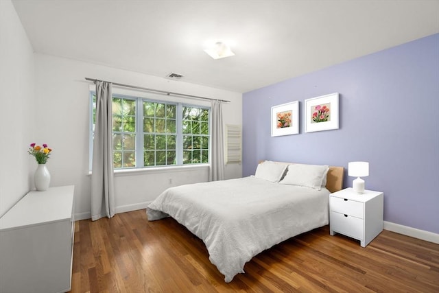 35 Bemis St, Weston, MA 02493 - bedroom featuring baseboards and wood finished floors