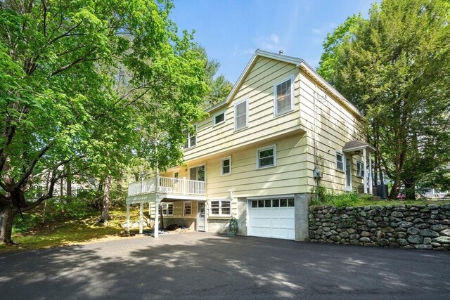 35 Bemis St, Weston, MA 02493 - view of side of property with a garage and driveway