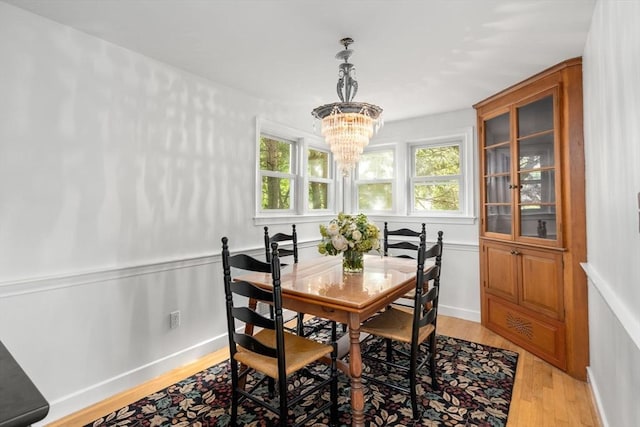 35 Bemis St, Weston, MA 02493 - dining area featuring light wood-type flooring and a chandelier