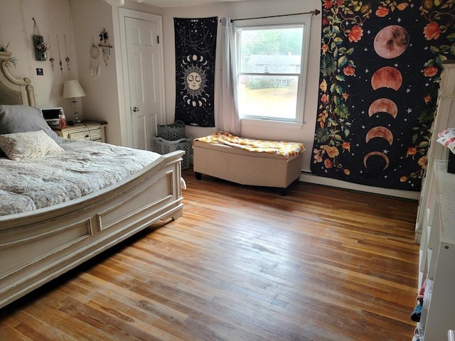 bedroom featuring light wood-style floors