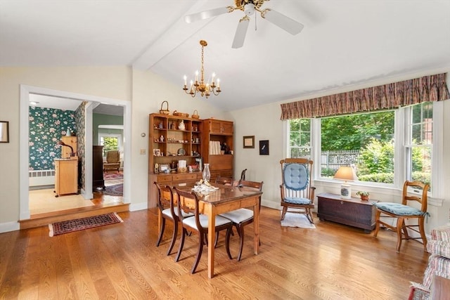 52 Harding Rd, Lexington, MA 02420 - dining space featuring radiator, light wood-style floors, a chandelier, a ceiling fan, and baseboards