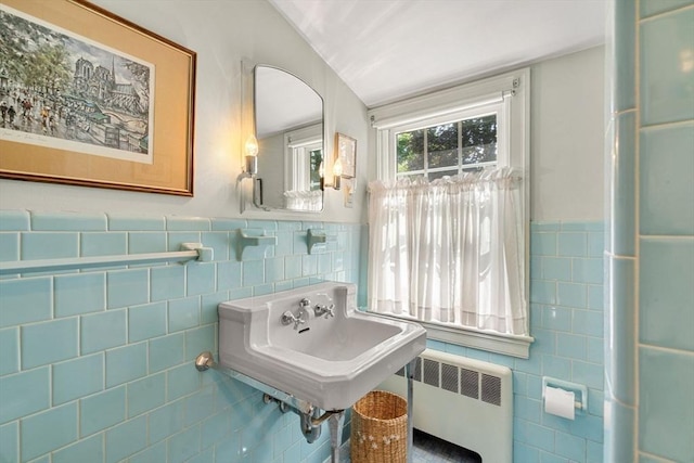 52 Harding Rd, Lexington, MA 02420 - bathroom with tile walls, radiator heating unit, a wainscoted wall, and vaulted ceiling