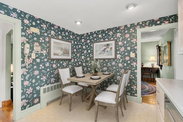 52 Harding Rd, Lexington, MA 02420 - dining space with radiator heating unit, wallpapered walls, and baseboards