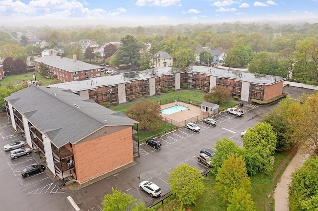 drone / aerial view of a pool